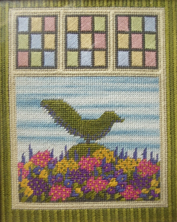 topiary bird with spring flowers